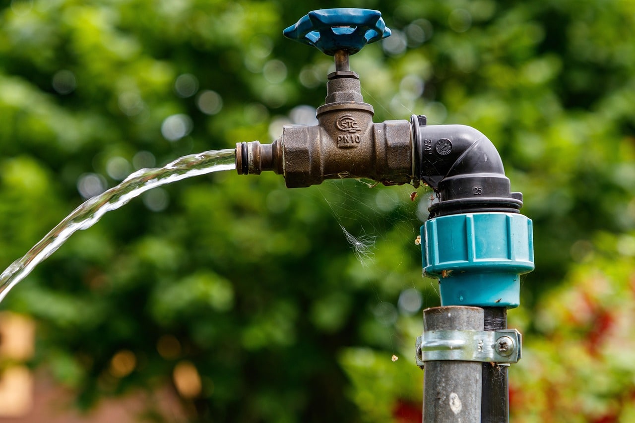 Outdoor water line spigot running